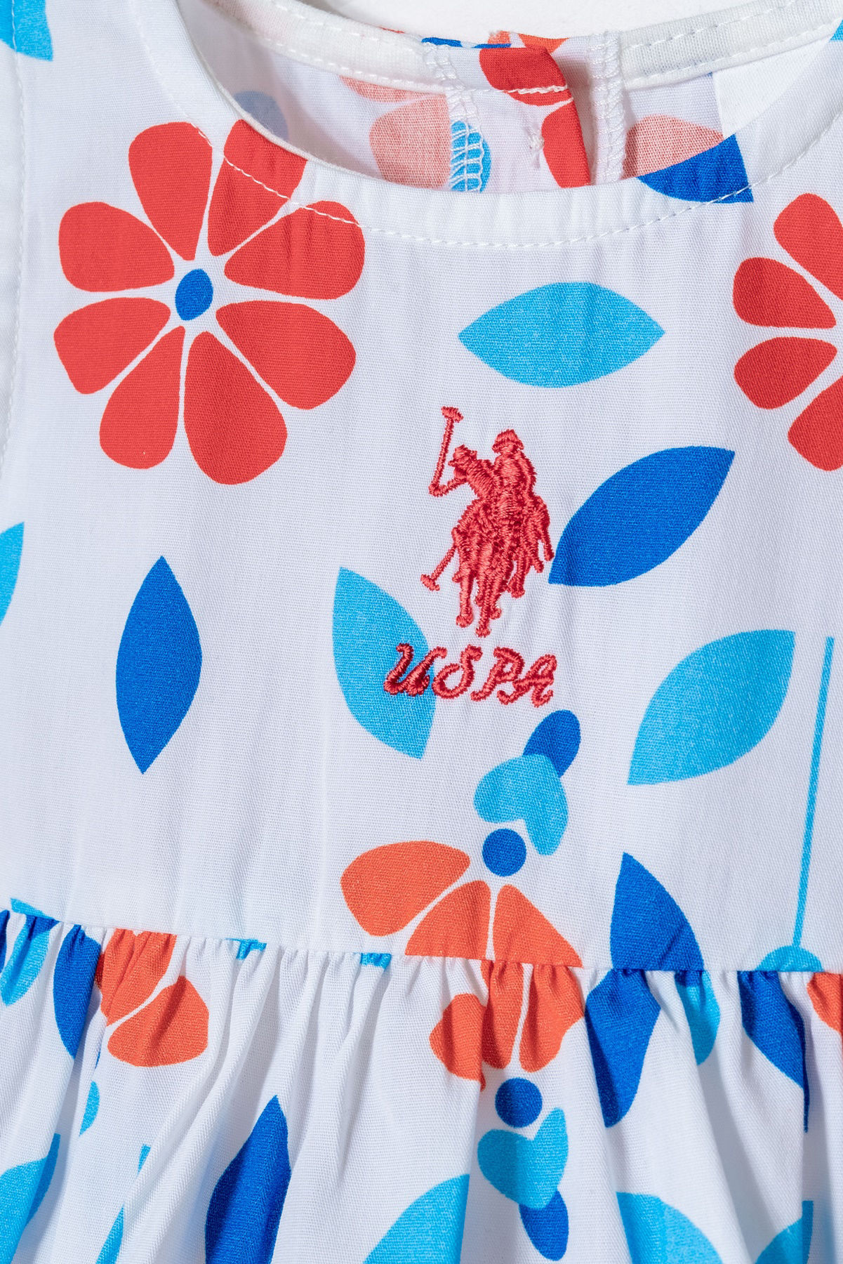 Rochie albă cu flori oranj 